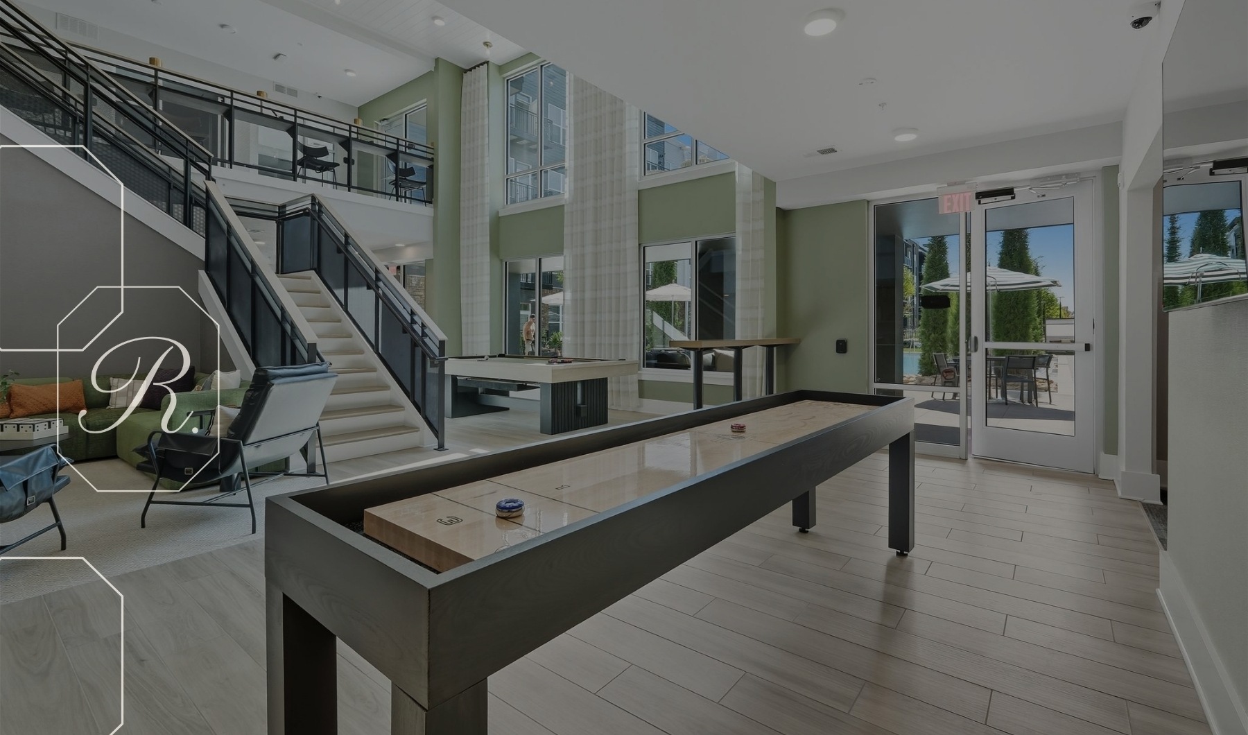 Amazing amenities at The Rowley a room with a pool table and chairs