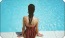 a person sitting by a pool