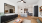 Inviting open-concept living area featuring a modern kitchen, elegant seating, and stylish decor with warm natural tones in Murfreesboro